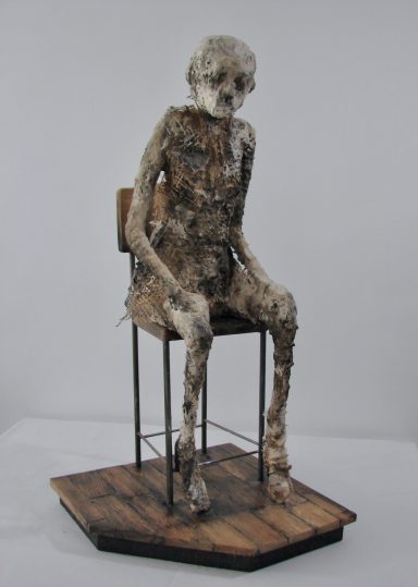 Plaster seated figure by Adele Walker